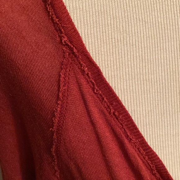 Red sheer-ish knit tunic with asym scraggly hem bohemian style deep scoop neck. - Picture 9 of 10